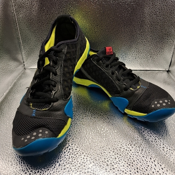 New Balance Shoes - New Balance Black, Yellow and Blue Mininus Trail Sneakers Women's Size 7.5
